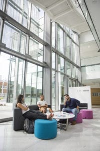 The collaborative spaces promote casual and scholarly interactions among students, faculty, and staff.